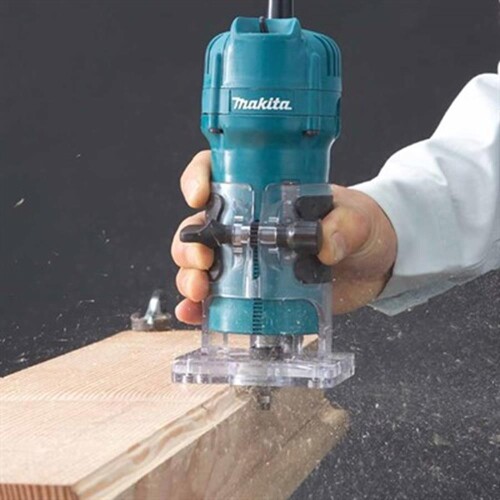 tupia-eletrica-manual-1-4-pol-530w-110v-3709-makita_08_FEMZTUP011.jpg